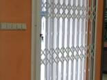Розсувні решітки для вікот та дверей - фото 8